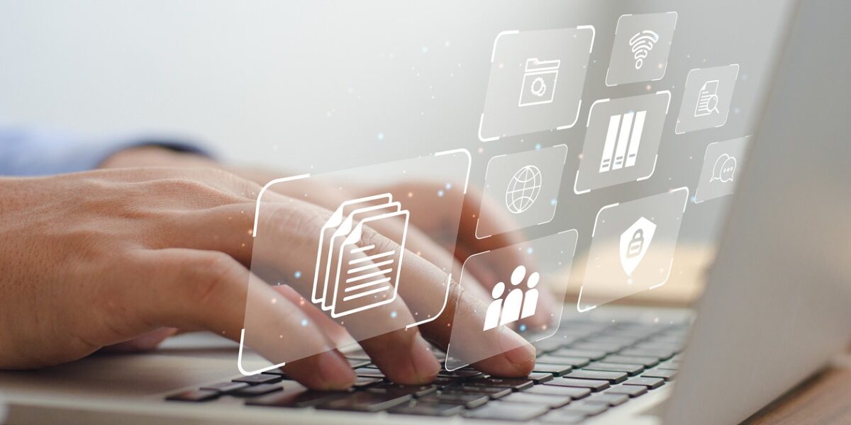 a-business-man-using-a-computer-to-manage-documents-online-document-picture-id1342186559